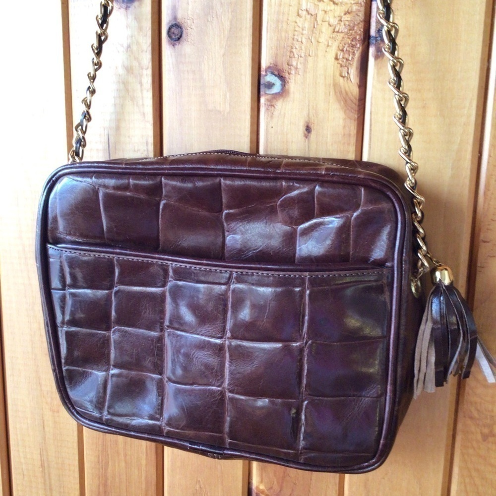 L. J. Simone croc embossed bag with chain strap and tassel.